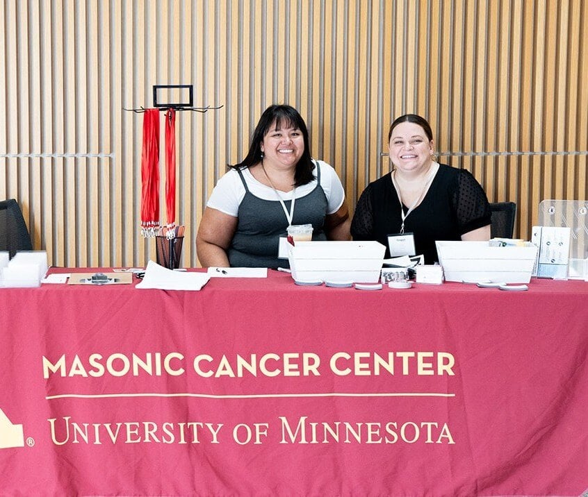  Liz Danley and Lissa Martinez Huebner from the Masonic Cancer Center at CaregiverCONx 2024 